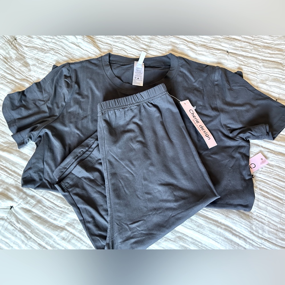 NWT, Woman’s Biker shorts & T-shirt set.